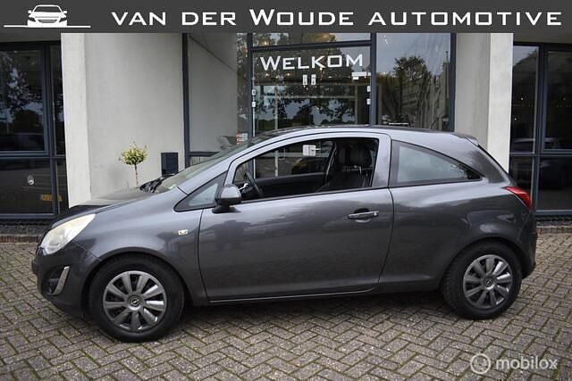 Grijs Gebruikt 2012 Opel Corsa Edition Hatchback | € 1.750 (Eerlijke prijs) - Afbeelding 1/4