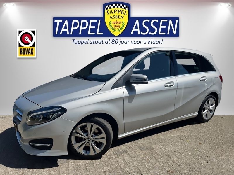 Grijs Gebruikt 2018 Mercedes B180 Ambition MPV | € 16.950 (Eerlijke prijs) - Afbeelding 1/4