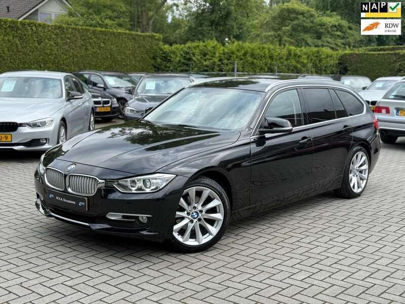 Zwart, metallic lak Gebruikt 2013 BMW 316 Executive Stationwagen | € 12.950 (Iets duurder) - Afbeelding 1/4