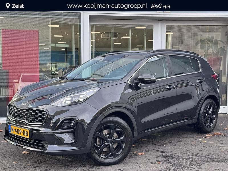 (1k) black pearl Gebruikt 2021 Kia Sportage SUV | € 28.900 (Eerlijke prijs) - Afbeelding 1/4