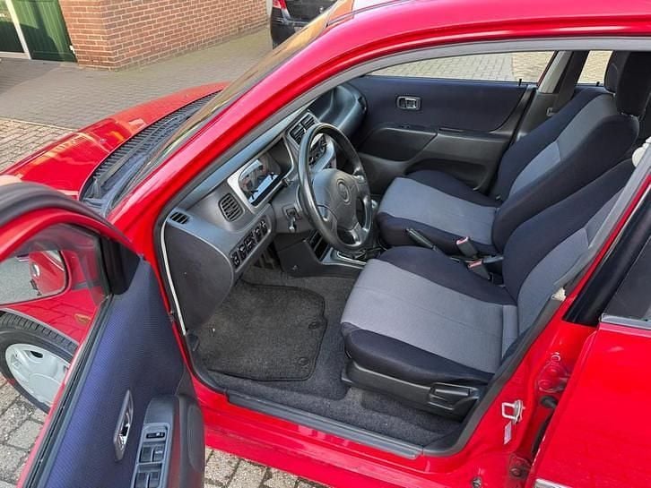 Occasion Daihatsu Sirion 102 PK (75 kW) 2001 Rood Hatchback