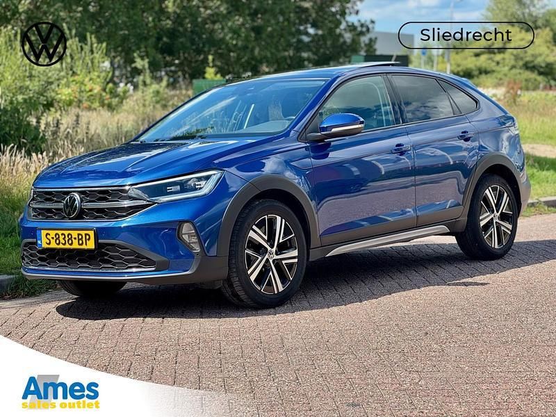 Blauw Gebruikt 2023 VW Taigo Style SUV | € 25.995 (Eerlijke prijs) - Afbeelding 1/3