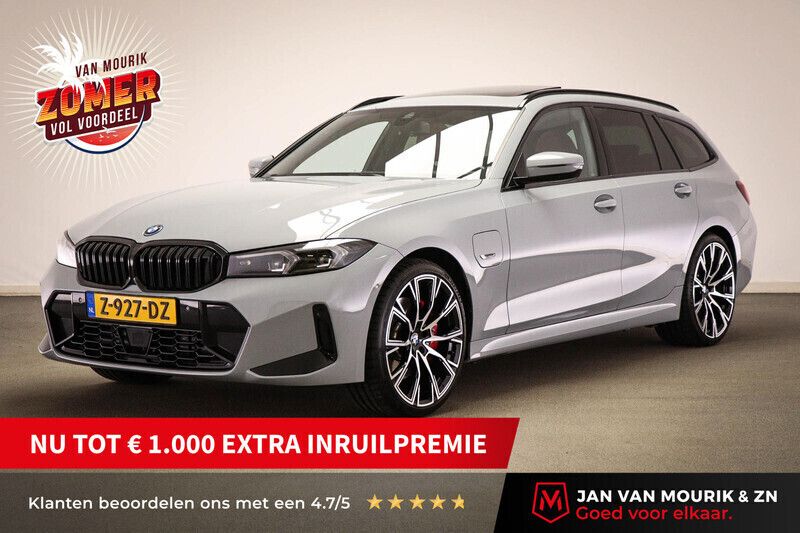 Grijs Gebruikt 2023 BMW 330e M Sport Stationwagen | € 50.095 (Iets duurder) - Afbeelding 1/4