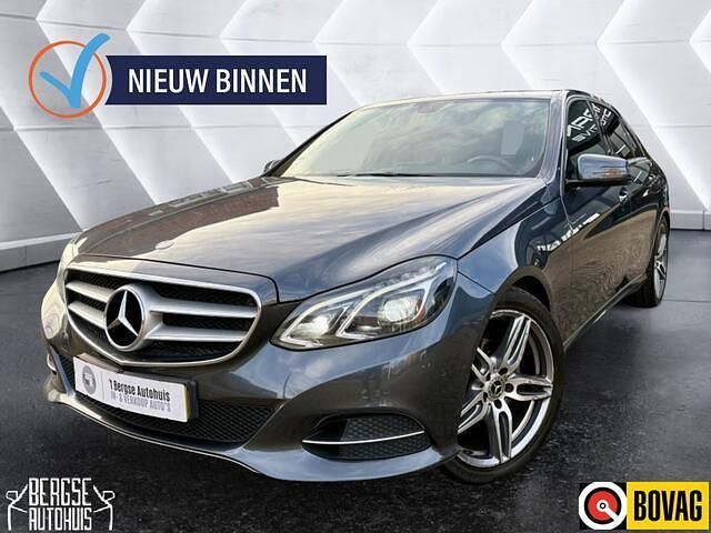 Grijs Occasion 2015 Mercedes E220 AMG Sedan | € 10.990 (Goede deal) - Afbeelding 1/4