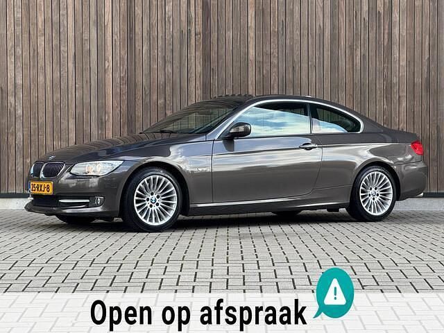 Bruin Gebruikt 2011 BMW 325 Coupé | € 16.950 (Eerlijke prijs) - Afbeelding 1/4