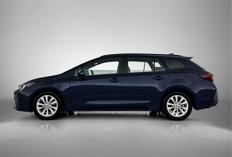 Occasion Toyota Corolla Hybrid Limited 2024 Blauw Stationwagen