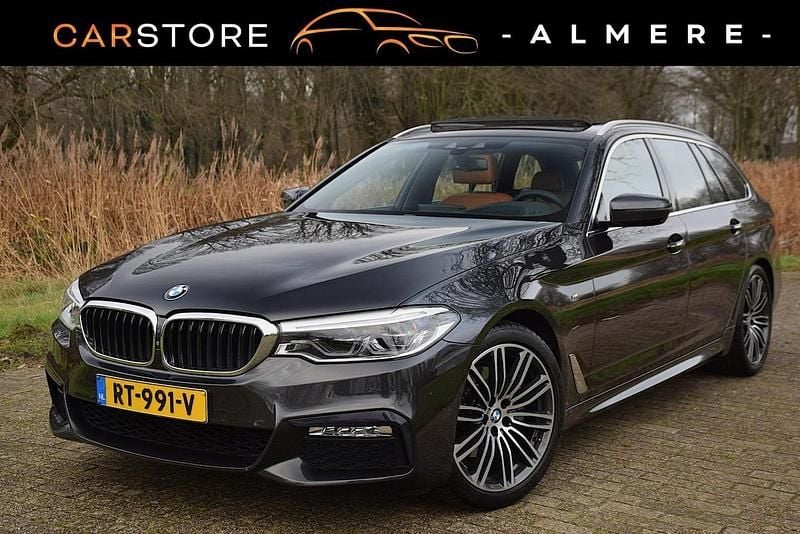 Grijs Gebruikt 2018 BMW 520 Executive Stationwagen | € 25.950 (Duur) - Afbeelding 1/4