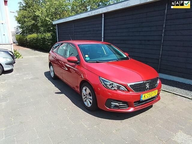 Rood (metallic) Gebruikt 2018 Peugeot 308 SW GT-line Stationwagen | € 8.949 (Super prijs) - Afbeelding 1/4