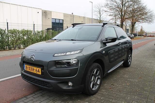 Grijs (metallic) Gebruikt 2014 Citroën C4 Cactus Shine Hatchback | € 6.350 (Goede deal) - Afbeelding 1/4