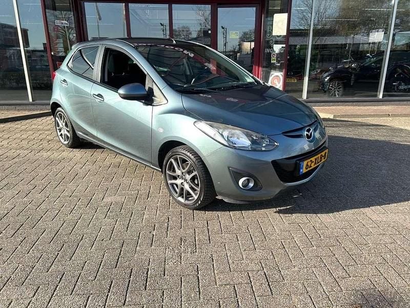 Grijs Gebruikt 2012 Mazda 2 Hatchback | € 6.799 (Eerlijke prijs) - Afbeelding 1/4
