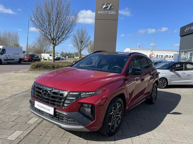 Sunset red (rood metallic) Gebruikt 2023 Hyundai Tucson N Line SUV | € 39.995 (Duur) - Afbeelding 1/4