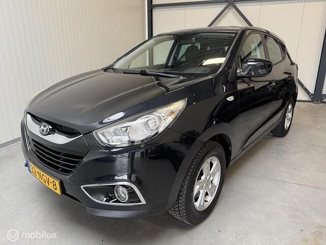 Zwart Occasion 2010 Hyundai ix35 Dynamiq SUV | € 5.250 (Goede deal) - Afbeelding 1/4