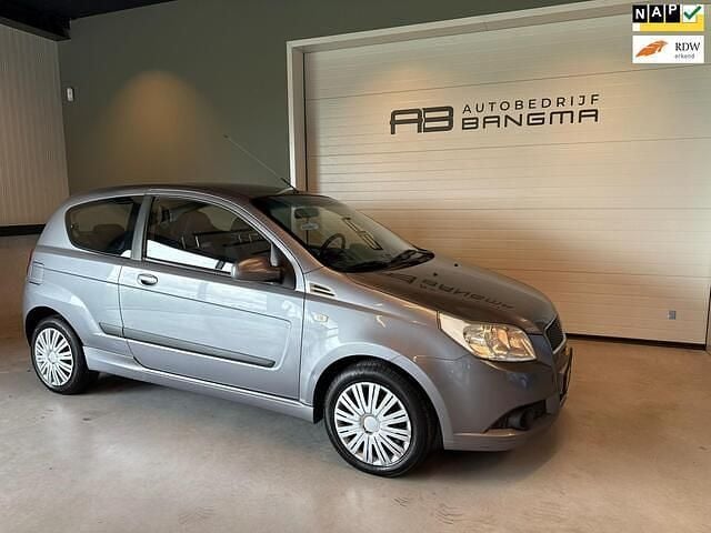 Grijs Gebruikt 2009 Chevrolet Aveo LS Hatchback | € 1.750 (Eerlijke prijs) - Afbeelding 1/4
