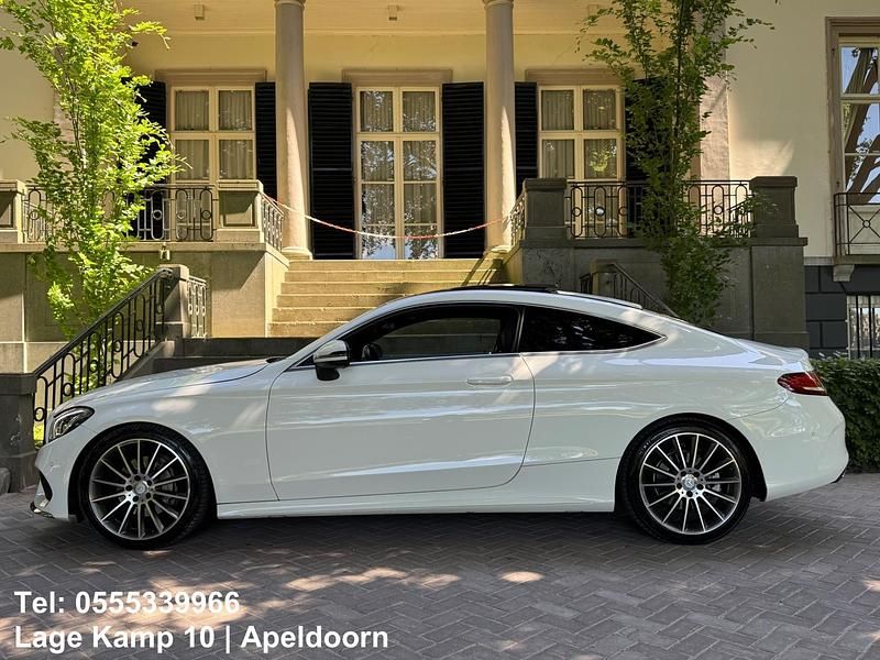 Occasion Mercedes C180 AMG line 157 PK (115 kW) 2016 Wit Coupé