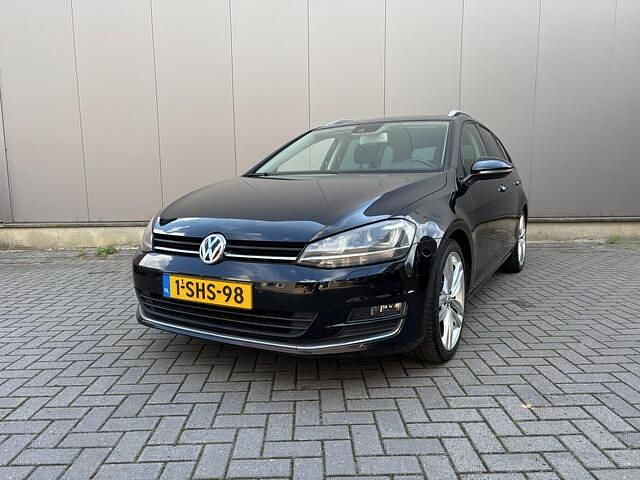Zwart Gebruikt 2013 VW Golf VII Highline Stationwagen | € 7.450 (Goede deal) - Afbeelding 1/4