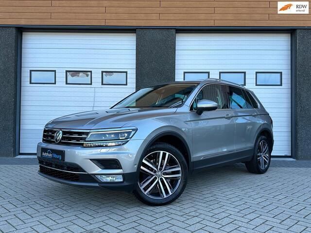 Grijs, metallic lak Gebruikt 2016 VW Tiguan Highline SUV | € 29.990 (Duur) - Afbeelding 1/4