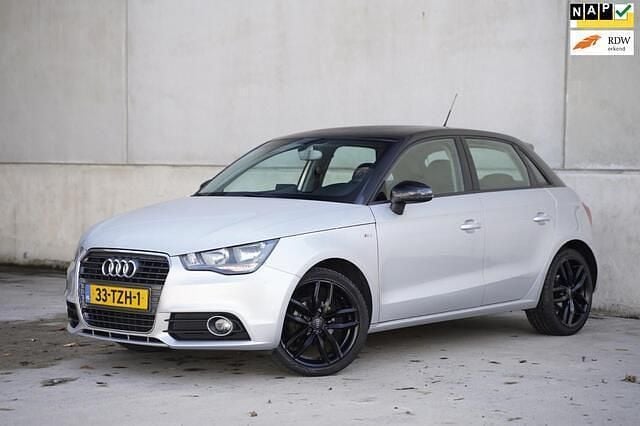 Grijs, metallic lak Gebruikt 2012 Audi A1 Sportback Proline Hatchback | € 5.750 (Eerlijke prijs) - Afbeelding 1/4