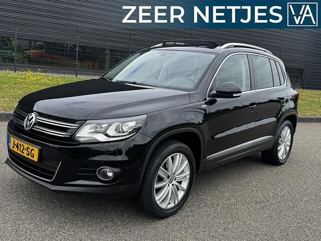 Zwart Gebruikt 2013 VW Tiguan SUV | € 12.998 (Eerlijke prijs) - Afbeelding 1/4