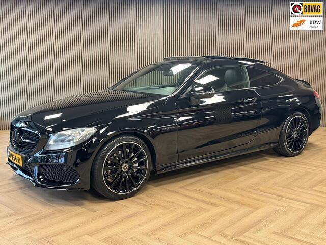Zwart Gebruikt 2018 Mercedes C180 Premium Plus Coupé | € 25.995 (Eerlijke prijs) - Afbeelding 1/4