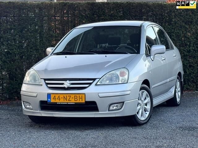 Grijs Occasion 2004 Suzuki Liana Exclusive Sedan | € 1.250 - Afbeelding 1/4