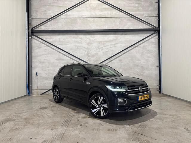 Zwart Gebruikt 2021 VW T-Cross R-line SUV | € 22.950 (Eerlijke prijs) - Afbeelding 1/4