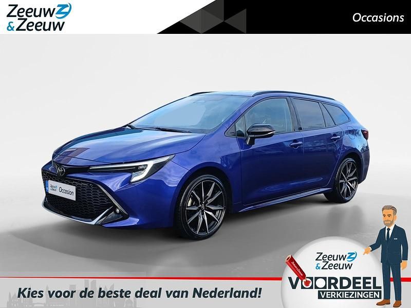Blauw Gebruikt 2023 Toyota Corolla Hybrid Sport Stationwagen | € 29.440 - Afbeelding 1/4