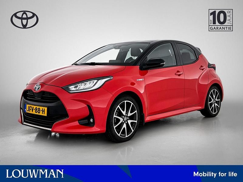 Rood Gebruikt 2021 Toyota Yaris Hybrid Executive Hatchback | € 20.995 (Eerlijke prijs) - Afbeelding 1/4