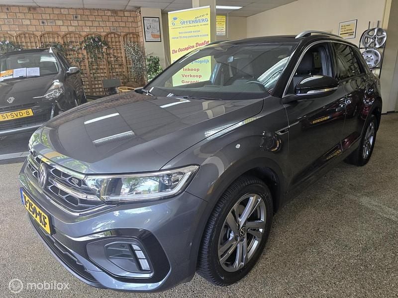 Grijs Gebruikt 2023 VW T-Roc R-line SUV | € 32.995 (Eerlijke prijs) - Afbeelding 1/4
