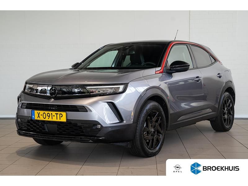 Grijs Gebruikt 2024 Opel Mokka-e SUV | € 23.890 (Eerlijke prijs) - Afbeelding 1/4