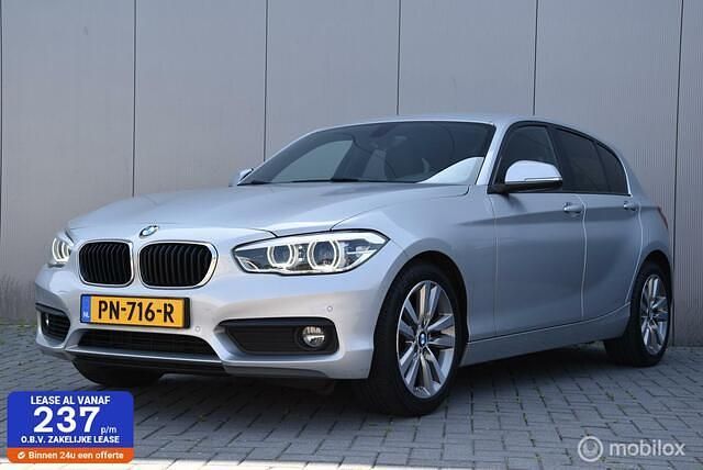 Grijs Gebruikt 2017 BMW 118 Executive Hatchback | € 13.960 (Goede deal) - Afbeelding 1/4