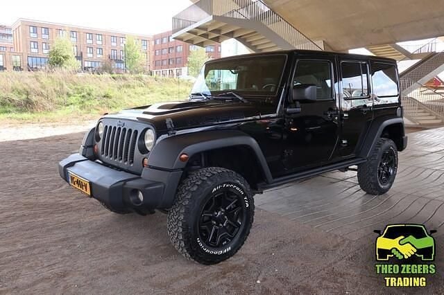 Zwart Gebruikt 2013 Jeep Wrangler Sport SUV | € 22.777 (Eerlijke prijs) - Afbeelding 1/4