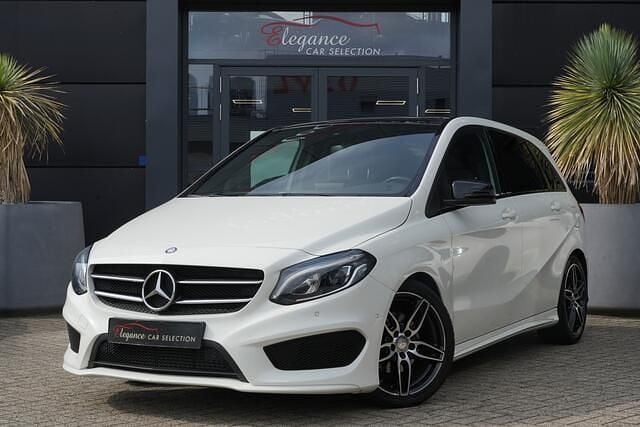 Wit Gebruikt 2016 Mercedes B180 AMG MPV | € 16.950 (Eerlijke prijs) - Afbeelding 1/4