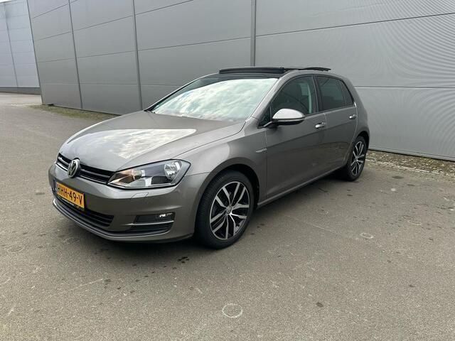 Grijs Gebruikt 2014 VW Golf VII Highline Hatchback | € 13.990 (Eerlijke prijs) - Afbeelding 1/4