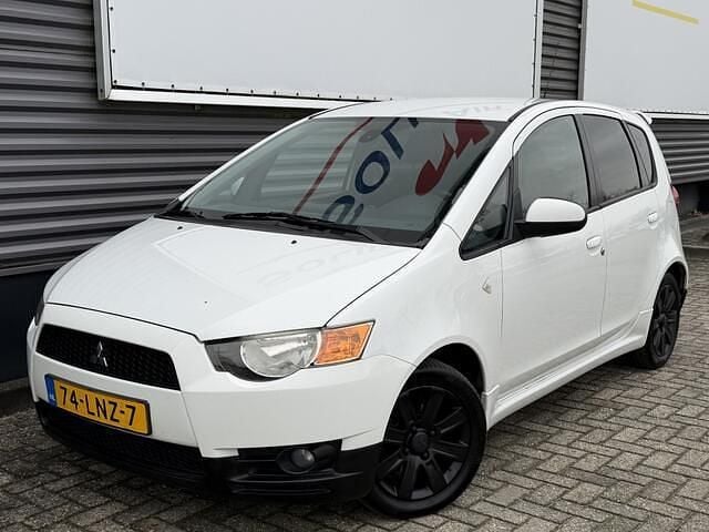 Wit Gebruikt 2010 Mitsubishi Colt Edition Hatchback | € 1.250 (Goede deal) - Afbeelding 1/4