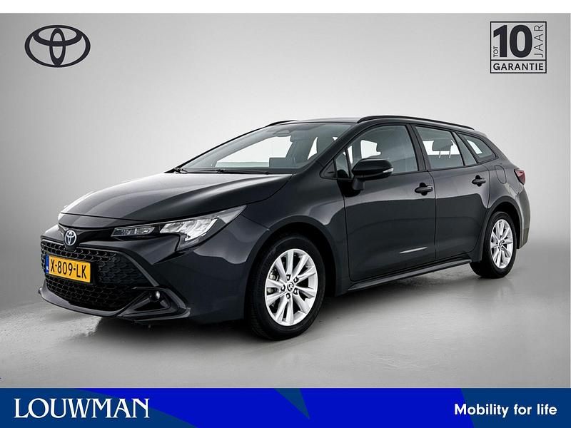 Zwart Gebruikt 2024 Toyota Corolla Hybrid Active Stationwagen | € 27.945 - Afbeelding 1/4