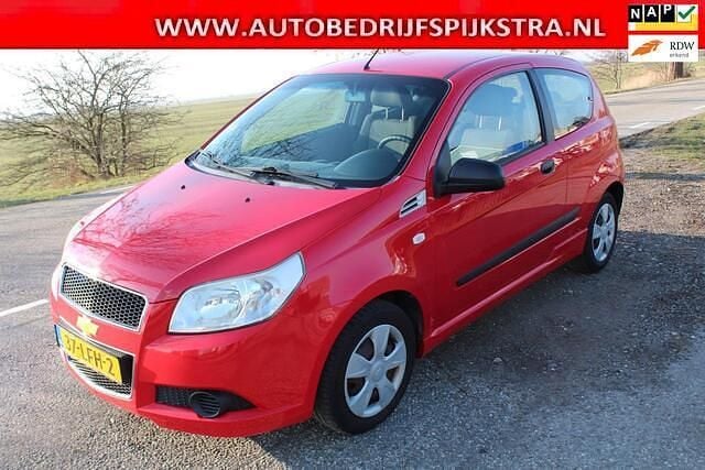 Rood (metallic) Occasion 2010 Chevrolet Aveo Hatchback | € 1.350 (Eerlijke prijs) - Afbeelding 1/4