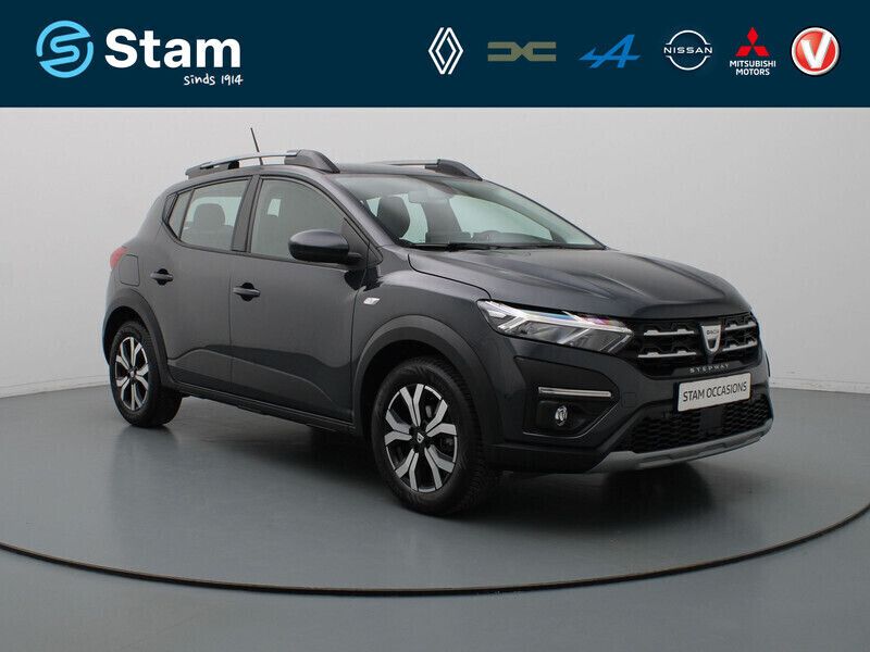 Grijs Gebruikt 2022 Dacia Sandero Essentiel Hatchback | € 16.990 (Eerlijke prijs) - Afbeelding 1/4