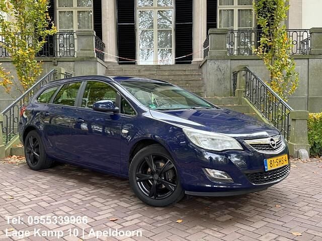 Blauw Gebruikt 2011 Opel Astra Cosmo Stationwagen | € 2.445 (Goede deal) - Afbeelding 1/4