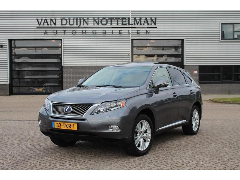 Grijs, metallic lak Gebruikt 2012 Lexus RX450h SUV | € 19.950 (Goede deal) - Afbeelding 1/4