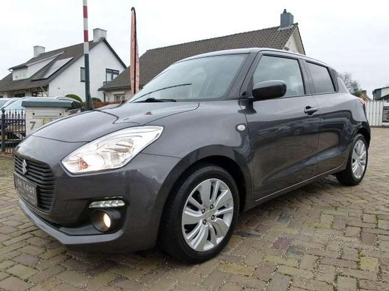 Grijs Gebruikt 2020 Suzuki Swift Hatchback | € 12.950 (Super prijs) - Afbeelding 1/4