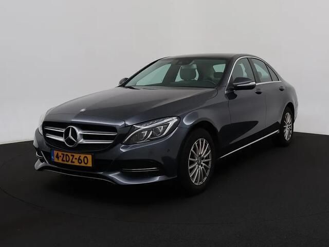 Grijs Gebruikt 2014 Mercedes C180 Sedan | € 16.450 (Eerlijke prijs) - Afbeelding 1/4