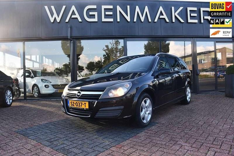 Zwart Gebruikt 2009 Opel Astra Essentia Stationwagen | € 2.250 (Eerlijke prijs) - Afbeelding 1/4