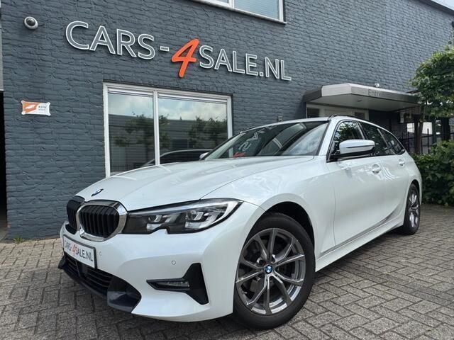 Wit Gebruikt 2020 BMW 320 Sport Line Stationwagen | € 23.750 (Goede deal) - Afbeelding 1/4