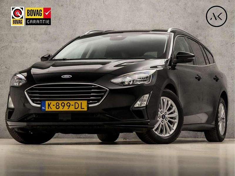 Zwart (metallic) Gebruikt 2020 Ford Focus Titanium X Stationwagen | € 14.945 (Goede deal) - Afbeelding 1/4