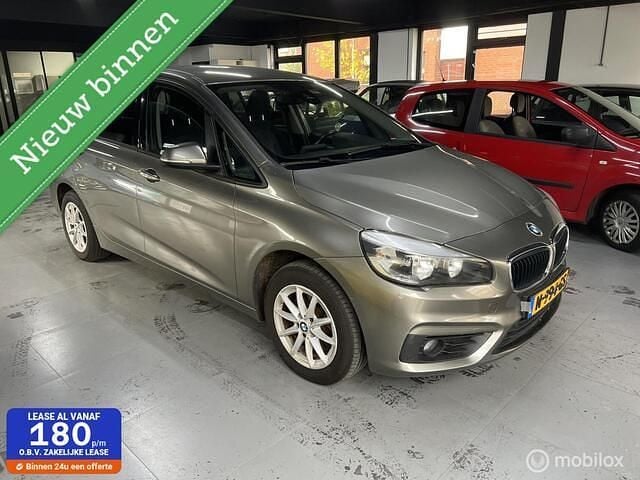 Grijs Gebruikt 2017 BMW 218 Executive Stationwagen | € 9.950 (Goede deal) - Afbeelding 1/4