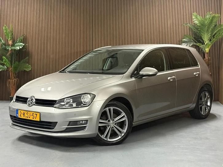 Grijs Gebruikt 2013 VW Golf VII Highline Hatchback | € 6.999 (Goede deal) - Afbeelding 1/4