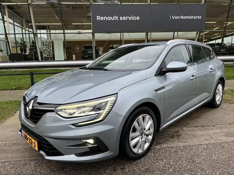 Grijs Gebruikt 2021 Renault Mégane IV Business Stationwagen | € 16.950 (Eerlijke prijs) - Afbeelding 1/4