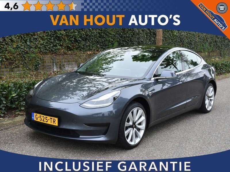 Grijs, metallic lak Gebruikt 2020 Tesla Model 3 Standard Range Sedan | € 19.350 (Goede deal) - Afbeelding 1/4