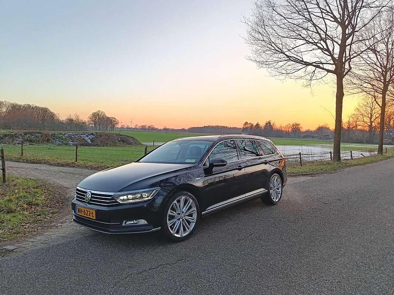 Zwart Gebruikt 2014 VW Passat Highline Stationwagen | € 15.000 - Afbeelding 1/4