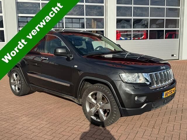 Grijs Gebruikt 2011 Jeep Grand Cherokee Overland SUV | € 7.900 - Afbeelding 1/4